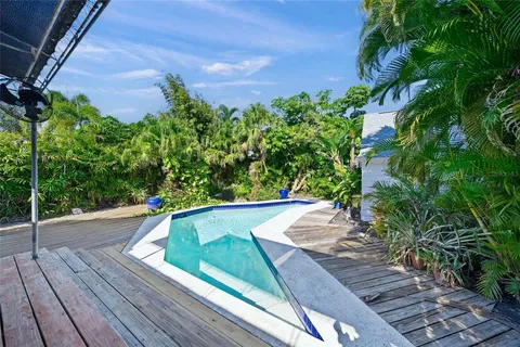 a view of a back yard of the house