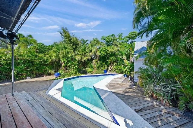 a view of a back yard of the house