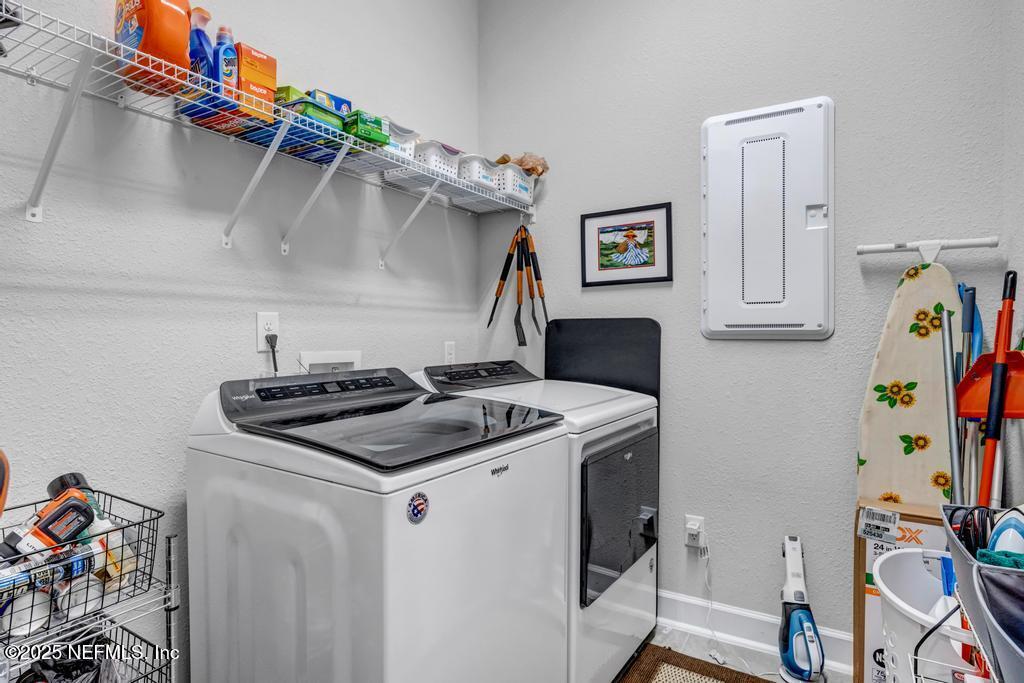 323 Glenneyre Circle St. Augustine, FL 32092 - Photo 42 of 53 a utility room with dryer and washer