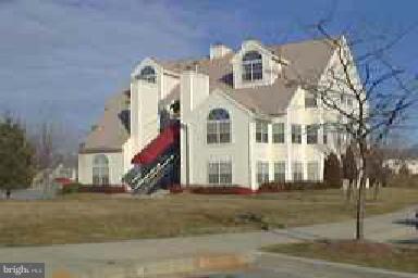 10518 Beacon Ridge Drive, Unit 302 Bowie, MD 20721 - Photo 1 of 1 a front view of a house