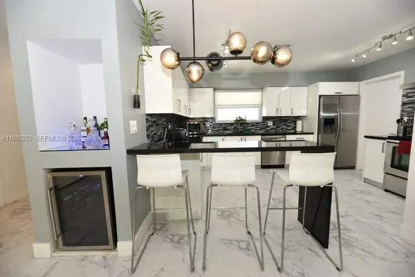 $7,990 | 909 North 13th Court, Hollywood, FL 33019