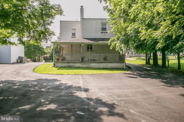 a view of a house with a swimming pool