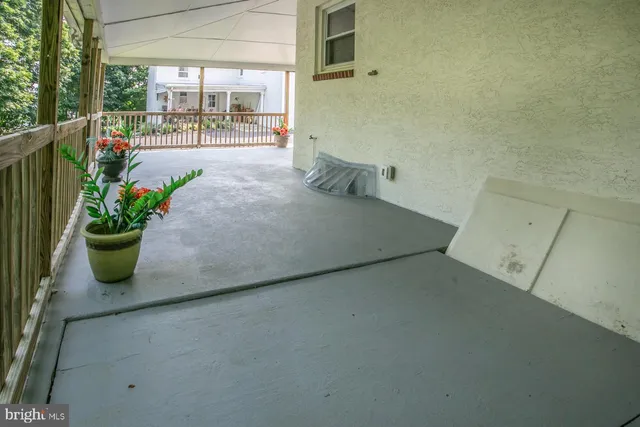 a view of a garden with an outdoor space