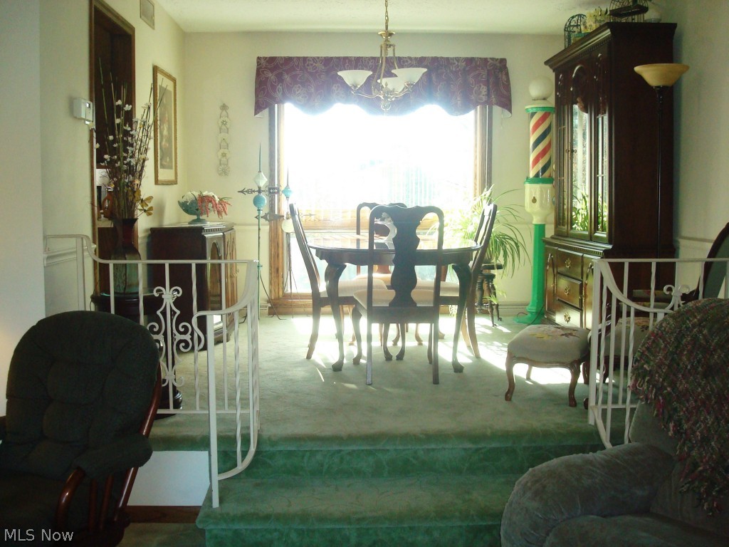 4626 Christman Road Green, OH 44319 - Photo 7 of 22 formal dining room with a new Anderson window