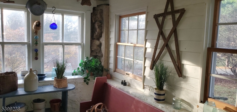 148 Mt Grove Road Califon, NJ 07830 - Photo 10 of 14 a very nice looking room with a large window and couch
