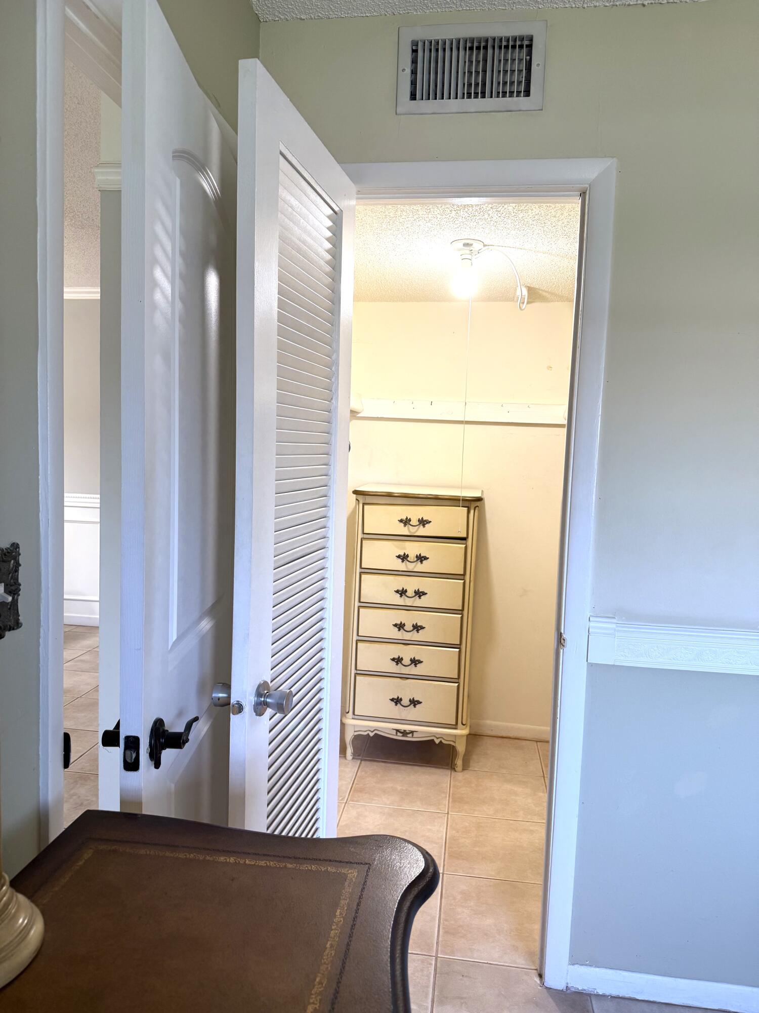 9272 Southwest 3rd Street, Unit 407 Boca Raton, FL 33428 - Photo 41 of 51 Primary Bedroom Walk-In Closet