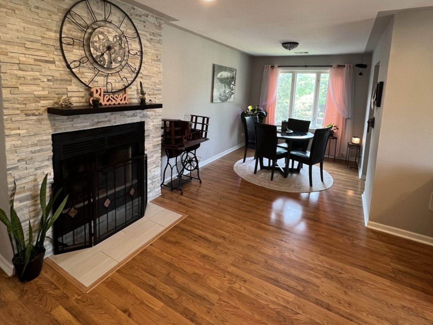 1230 Chalet Road, Unit 204 Naperville, IL 60563 - Photo 4 of 17 a living room with furniture a window and a fireplace