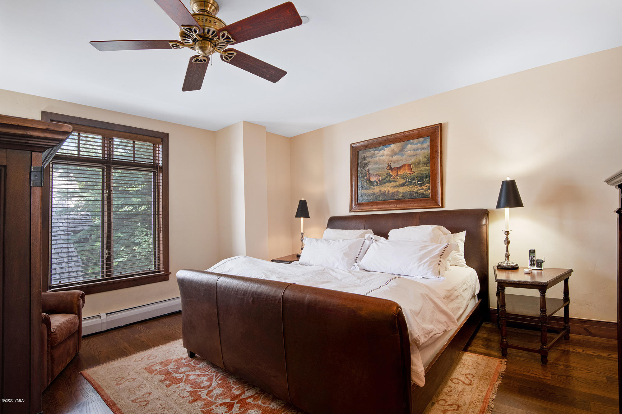 180 Daybreak Ridge Road, Unit 409 Avon, CO 81620 - Photo 3 of 47 a bedroom with a bed and a window