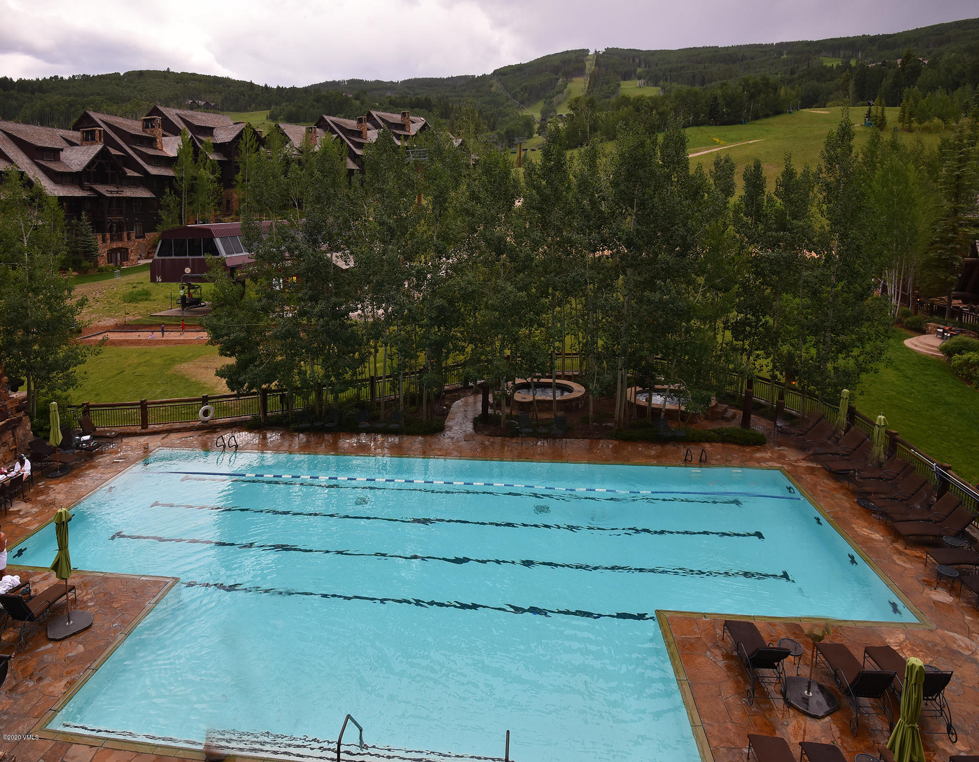180 Daybreak Ridge Road, Unit 409 Avon, CO 81620 - Photo 36 of 47 a view of a backyard