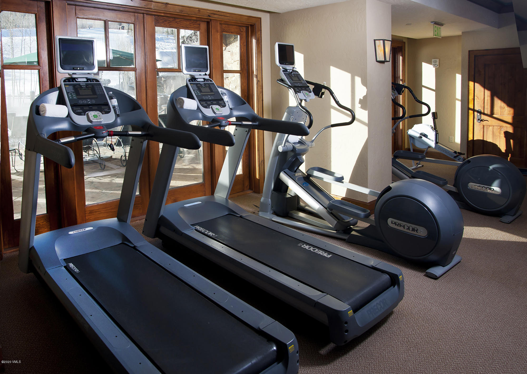 180 Daybreak Ridge Road, Unit 409 Avon, CO 81620 - Photo 38 of 47 a view of a room with gym equipment