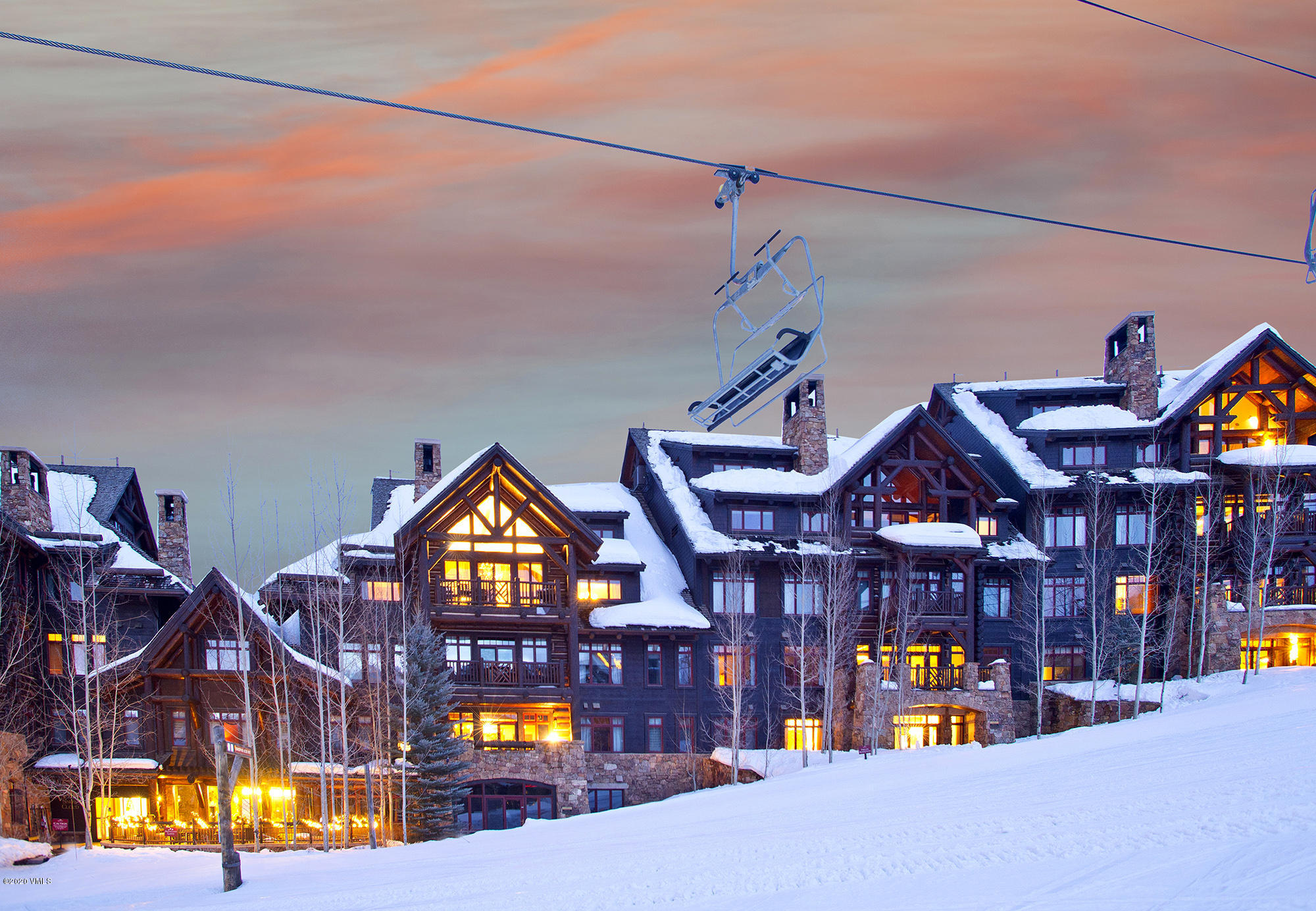 180 Daybreak Ridge Road, Unit 409 Avon, CO 81620 - Photo 45 of 47 a view of a large brick building with a clock on the wall