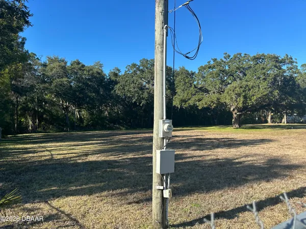 a view of a swimming pool with an outdoor space and seating area