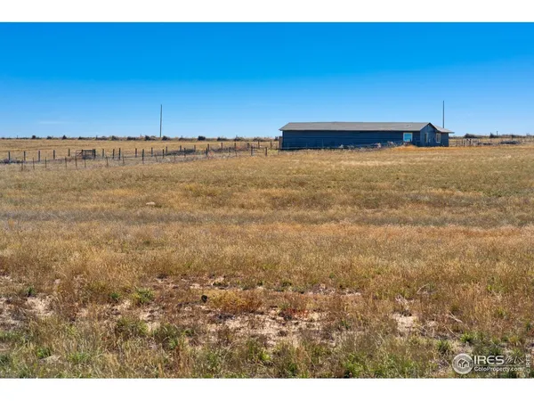 a view of ocean with sunset