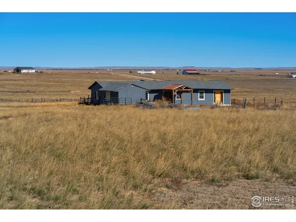 a view of house with ocean view