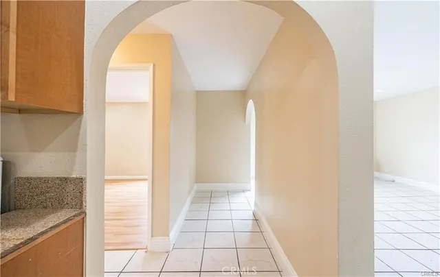 a bathroom with a sink vanity mirror and toilet