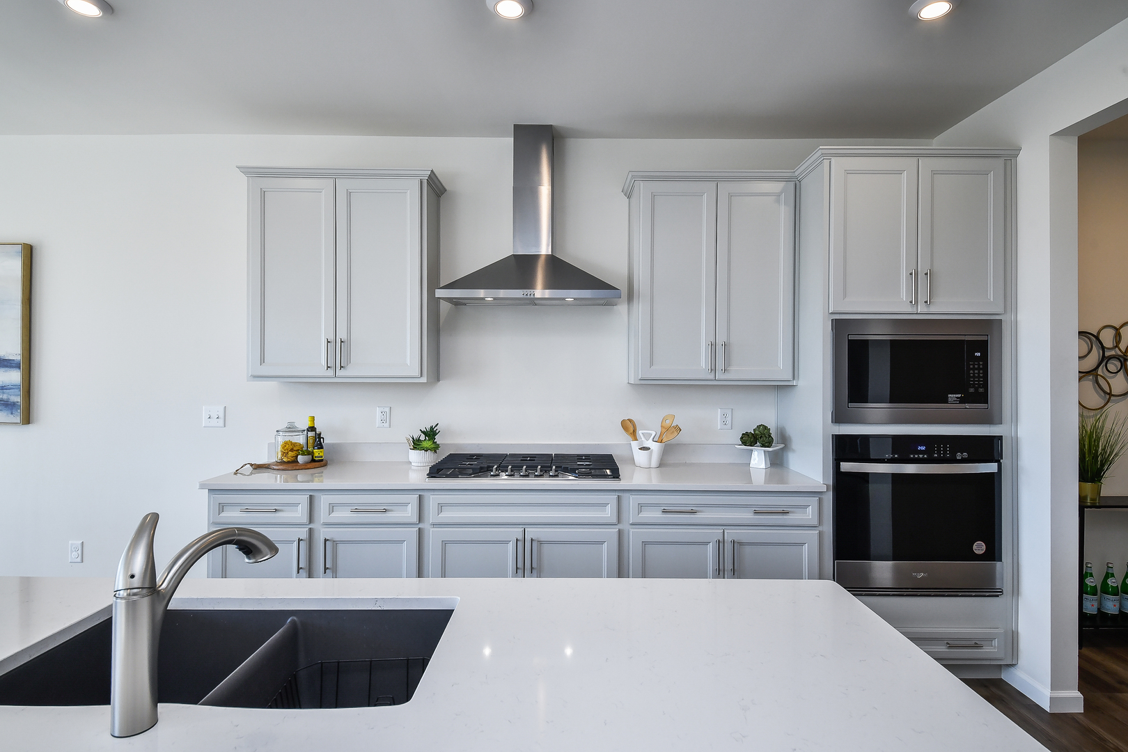 564 Thorne Street Batavia, IL 60510 - Photo 21 of 29 a kitchen with stainless steel appliances a sink a stove a microwave and cabinets