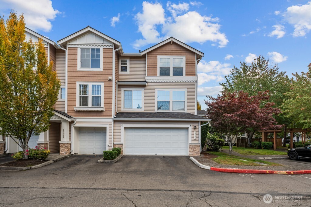 23228 59th Court South Kent, WA 98032 - Photo 2 of 31 a front view of a house with entertaining space