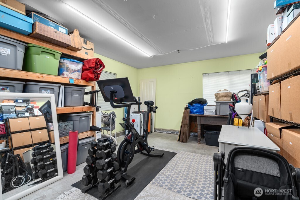 23228 59th Court South Kent, WA 98032 - Photo 25 of 31 a view of a room with gym equipment