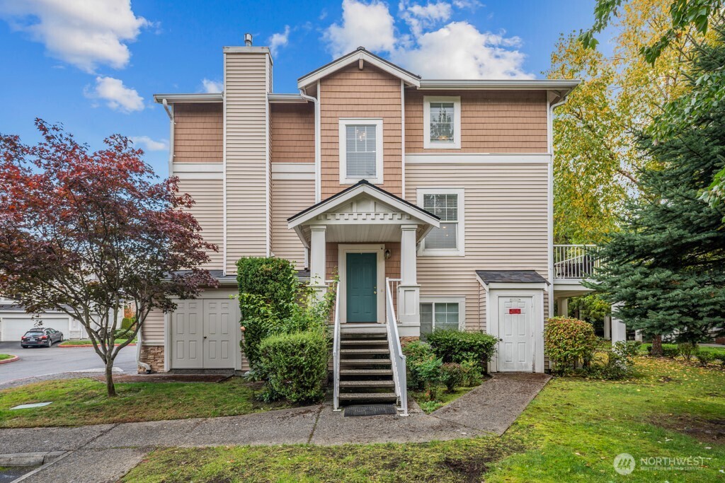 23228 59th Court South Kent, WA 98032 - Photo 3 of 31 a view of a house with a yard and large tree