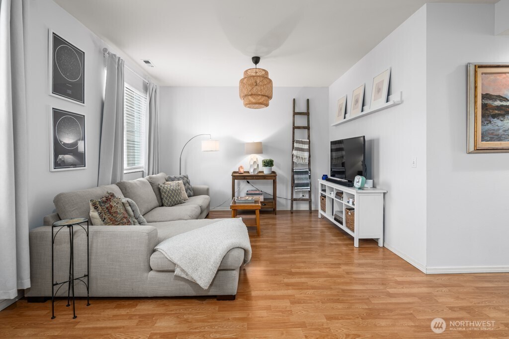 23228 59th Court South Kent, WA 98032 - Photo 7 of 31 a living room with furniture and a flat screen tv