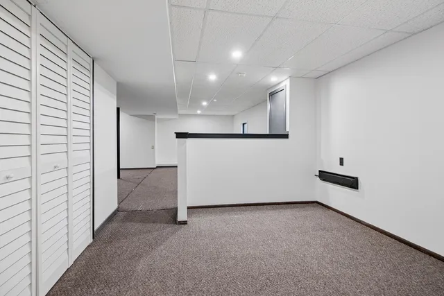 a kitchen with a sink stove and refrigerator