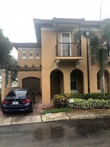 a house view with a garden space