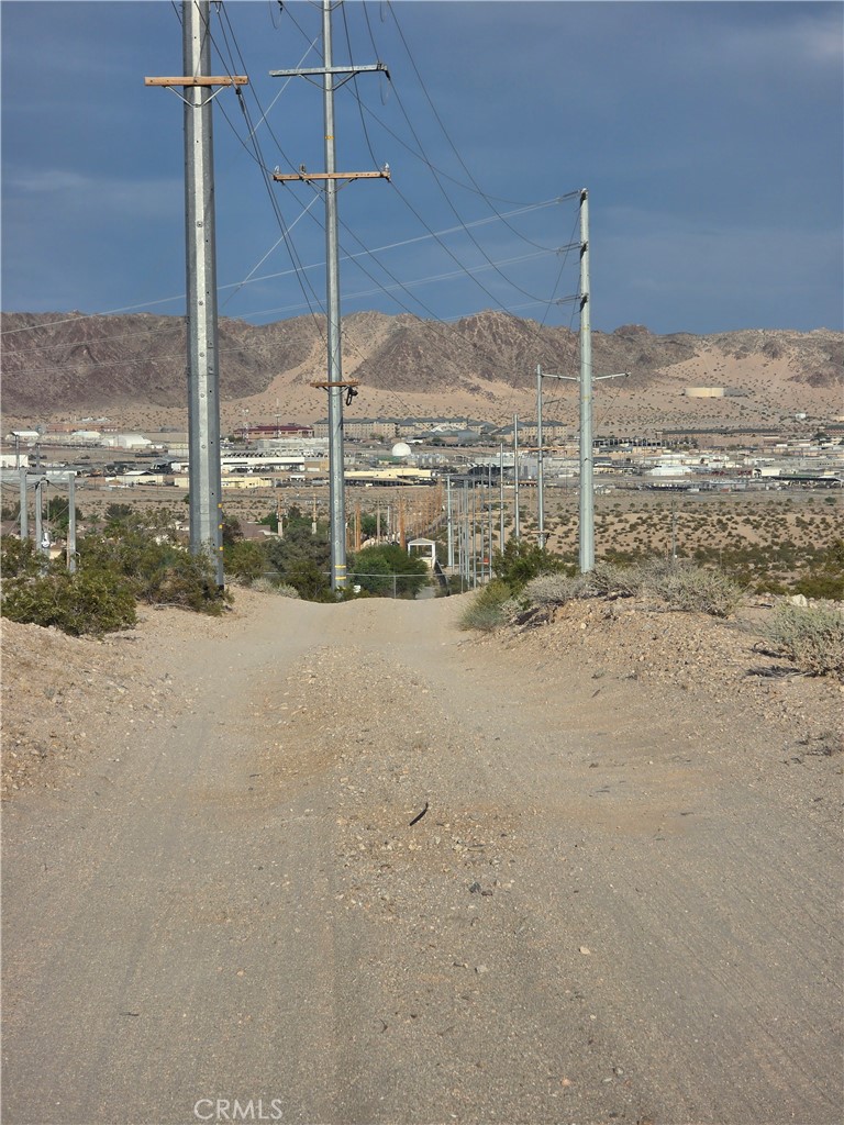 0 Brant Xing Road Twentynine Palms, CA 92277 - Photo 6 of 7 a view of a road with an ocean view