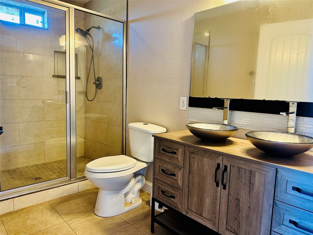 25417 Highway 6 Hempstead, TX 77445 - Photo 28 of 48 a bathroom with a sink toilet and shower