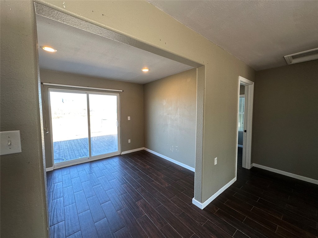 25417 Highway 6 Hempstead, TX 77445 - Photo 36 of 48 an empty room with wooden floor and windows