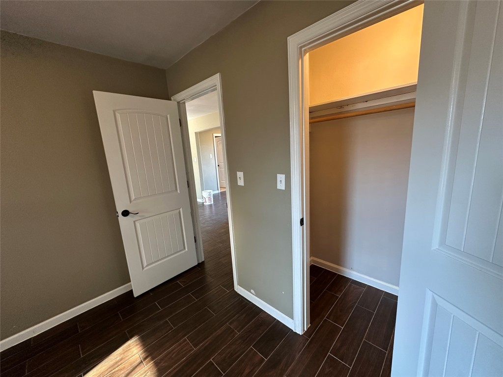 25417 Highway 6 Hempstead, TX 77445 - Photo 41 of 48 a view of a hallway with wooden floor and a hallway