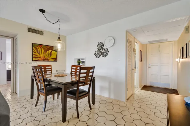 a view of a dining room with furniture
