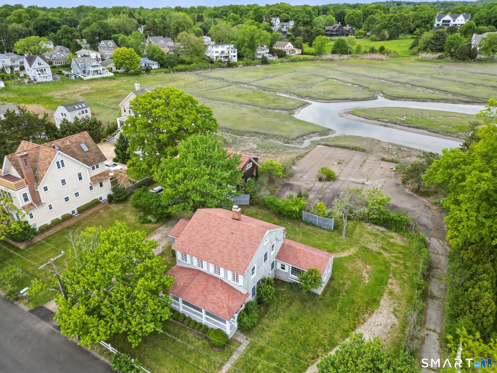 153 Middle Beach Road Madison, CT 06443 - Photo 2 of 40 An aerial view of the home and serpentine river. You can put a kayak in right from your backyard