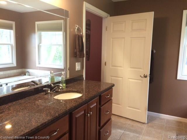 4770 Golf Club Road Howell, MI 48843 - Photo 51 of 59 Master Bath has granite counters
