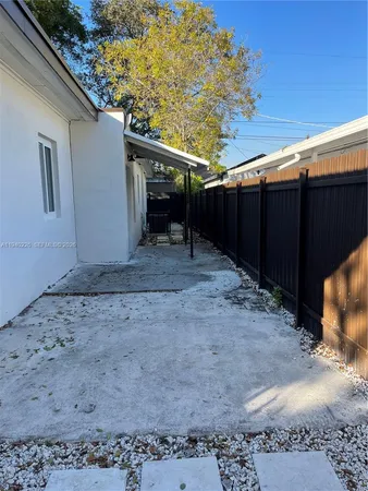 a view of a backyard space