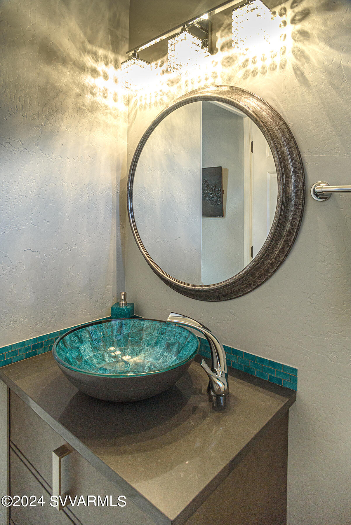25 Ranch Road Sedona, AZ 86336 - Photo 11 of 36 a bathroom with a mirror and vanity