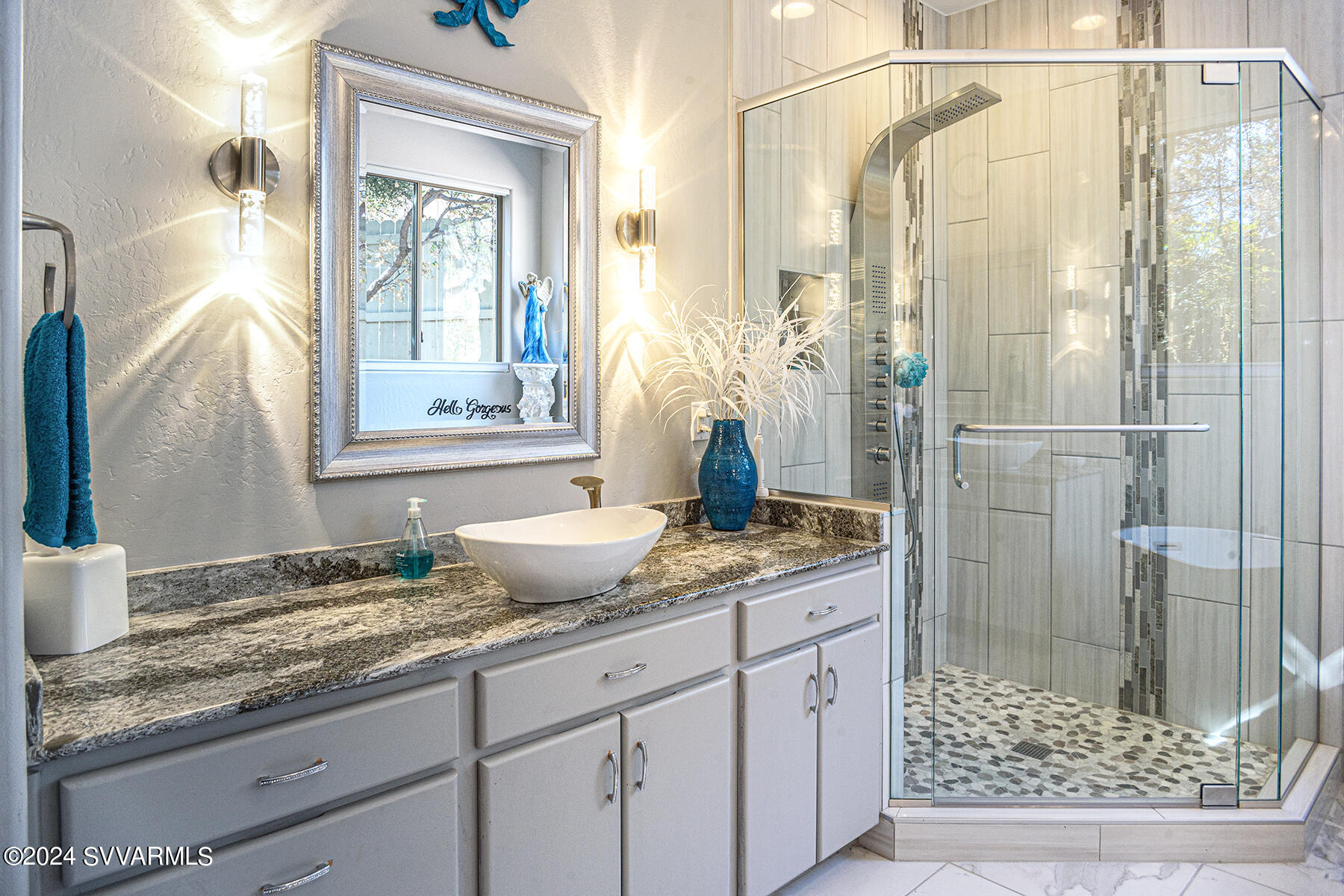 25 Ranch Road Sedona, AZ 86336 - Photo 13 of 36 a bathroom with a granite countertop sink and a mirror