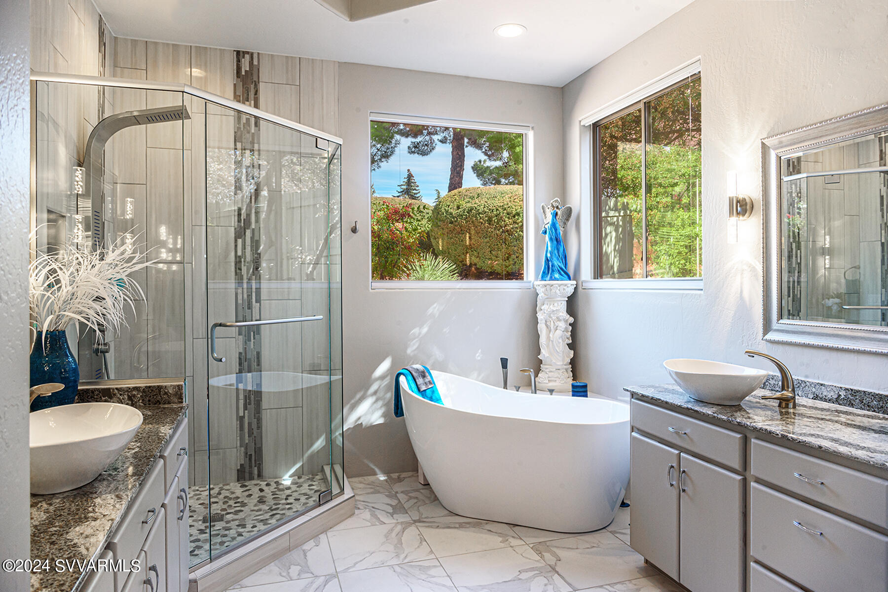 25 Ranch Road Sedona, AZ 86336 - Photo 14 of 36 a bathroom with a granite countertop sink and a bathtub