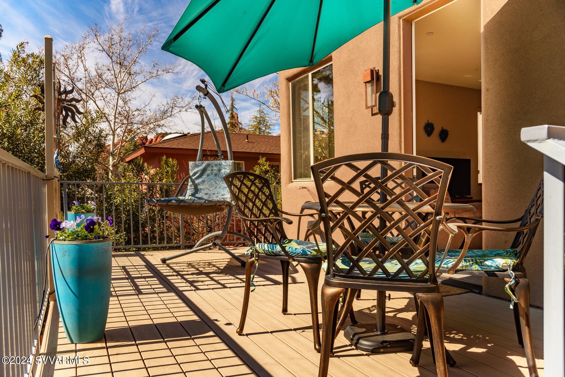 25 Ranch Road Sedona, AZ 86336 - Photo 23 of 36 a view of balcony with two chairs and a umbrella