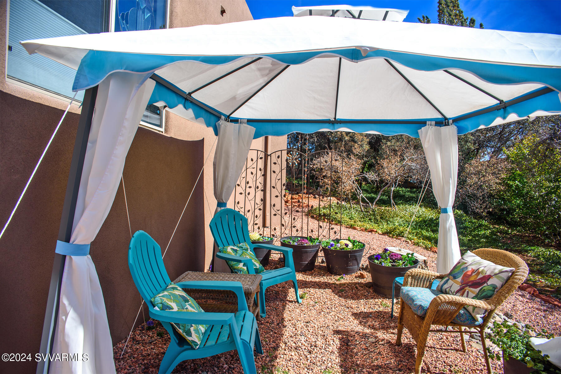 25 Ranch Road Sedona, AZ 86336 - Photo 24 of 36 a outdoor living space with furniture and garden view