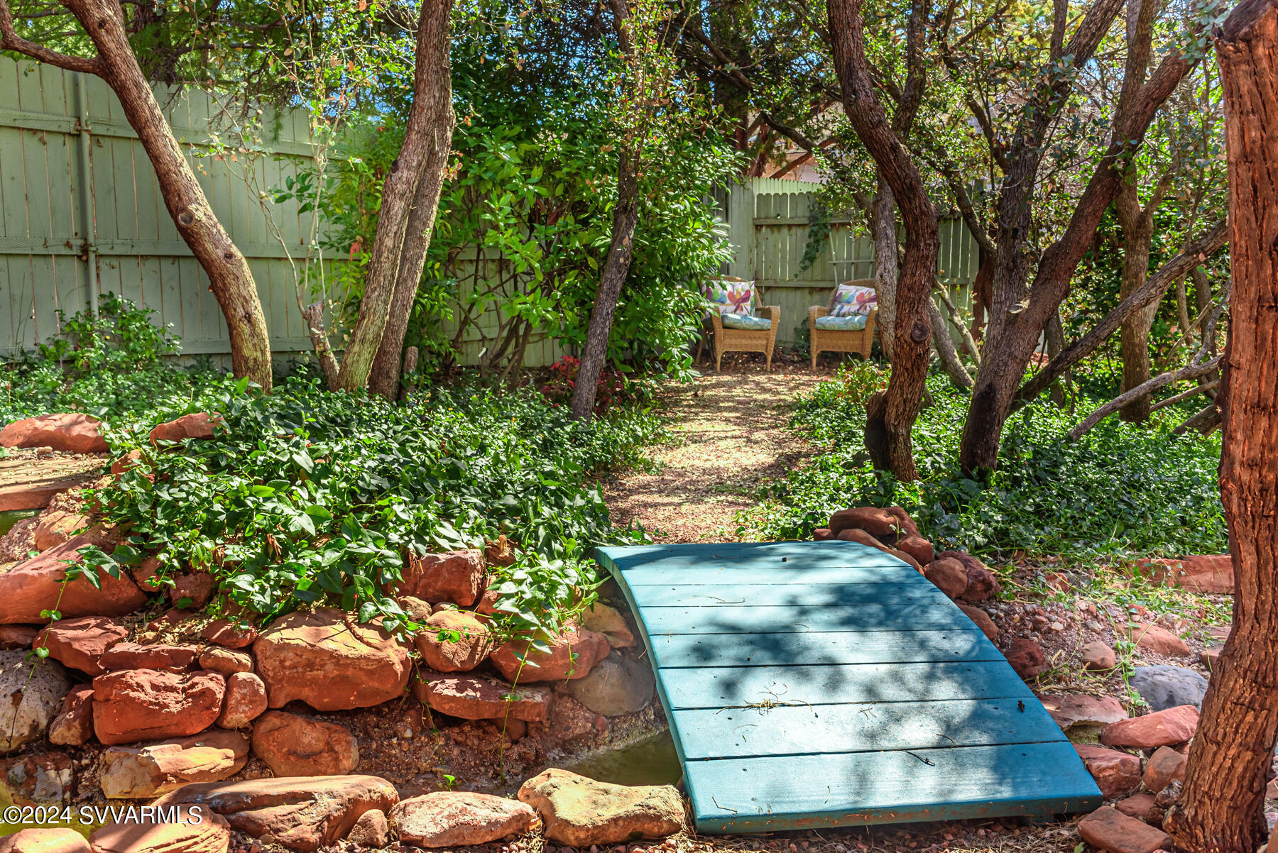25 Ranch Road Sedona, AZ 86336 - Photo 29 of 36 a view of a backyard with a garden