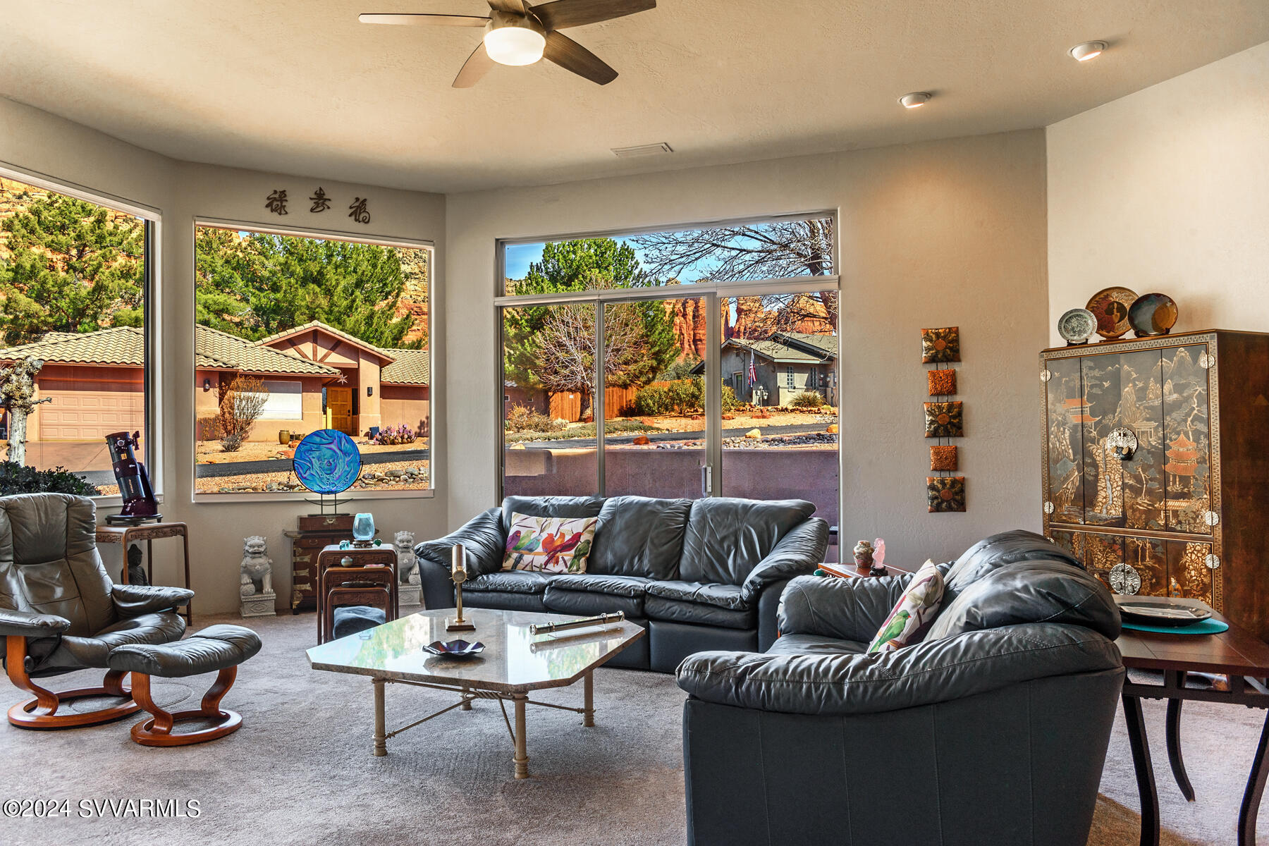 25 Ranch Road Sedona, AZ 86336 - Photo 4 of 36 a living room with furniture and a large window