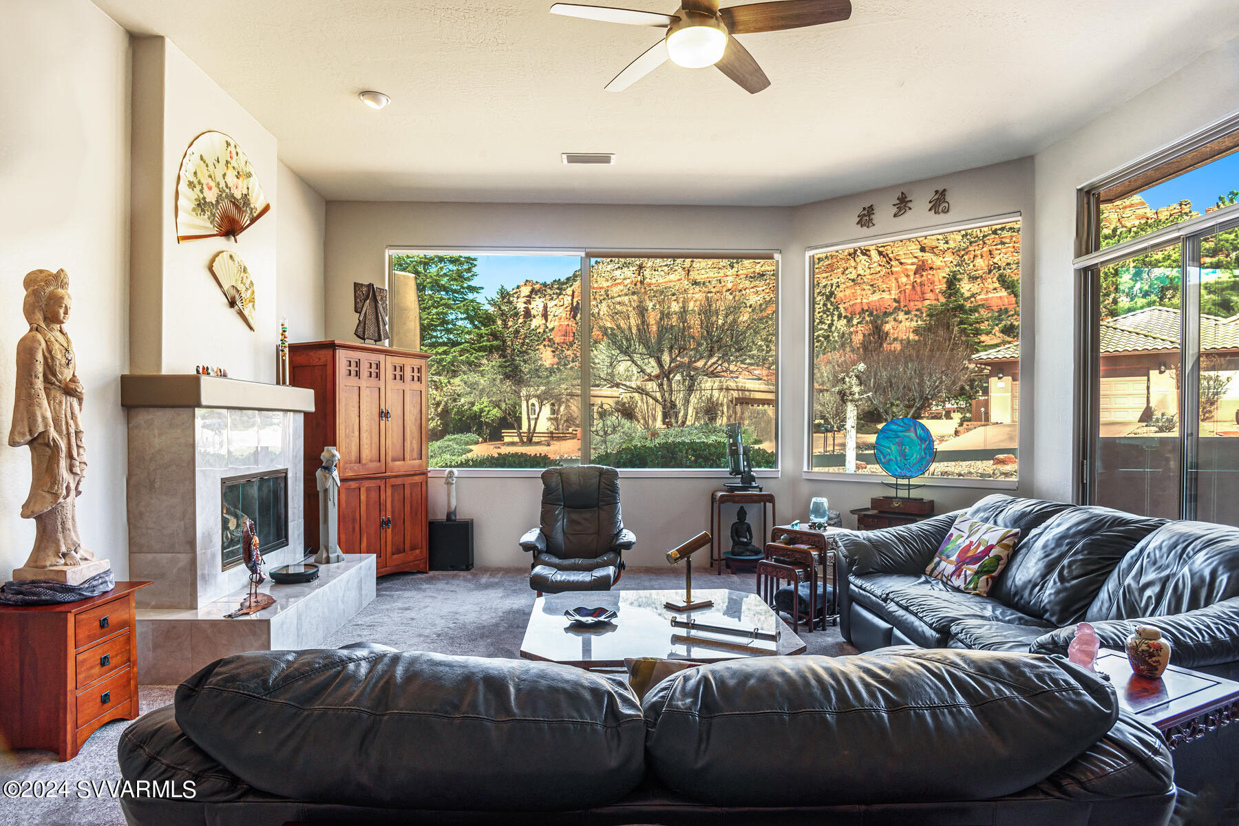 25 Ranch Road Sedona, AZ 86336 - Photo 5 of 36 a living room with furniture and a large window