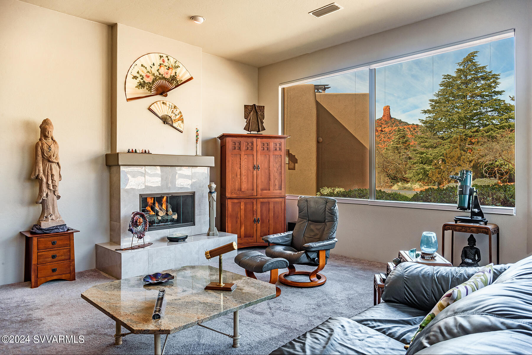25 Ranch Road Sedona, AZ 86336 - Photo 6 of 36 a living room with furniture and a fireplace