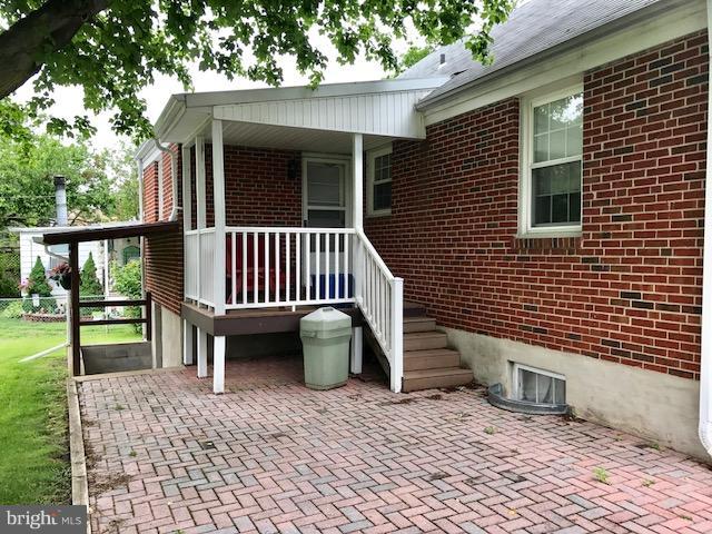 8118 Bon Air Road Baltimore, MD 21234 - Photo 6 of 27 Brick patio with covered backporch