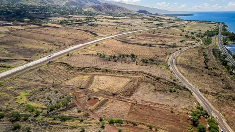 a view of mountain with beach