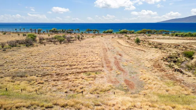 a view of ocean with beach