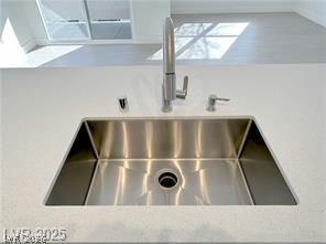 7255 West Sunset Road, Unit 2046 Las Vegas, NV 89113 - Photo 28 of 28 A sleek stainless steel undermount sink perfectly complements the pristine kitchen counter.