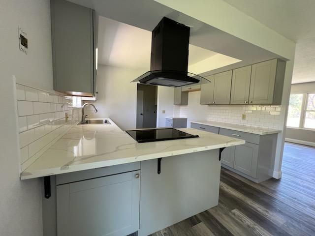 18690 Reeds Creek Road Red Bluff, CA 96080 - Photo 13 of 23 a kitchen with a sink a stove and a wooden floor