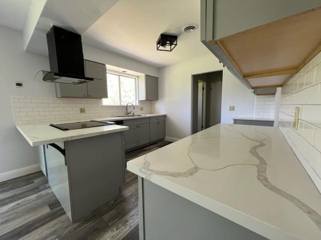 18690 Reeds Creek Road Red Bluff, CA 96080 - Photo 14 of 23 a kitchen with stainless steel appliances a sink a stove a microwave a sink and cabinets