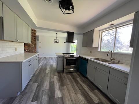 18690 Reeds Creek Road Red Bluff, CA 96080 - Photo 15 of 23 a large kitchen with a sink and wooden floor